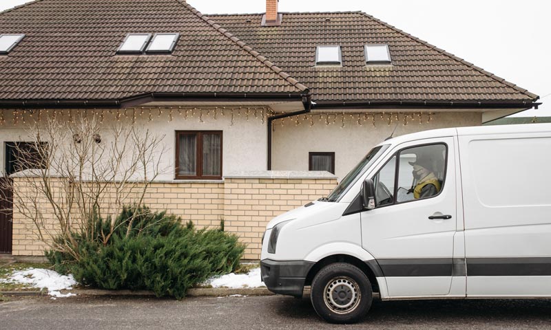 service van parked beside a house